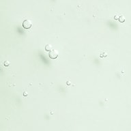 Små bubblor utspridda över en slät bakgrund.