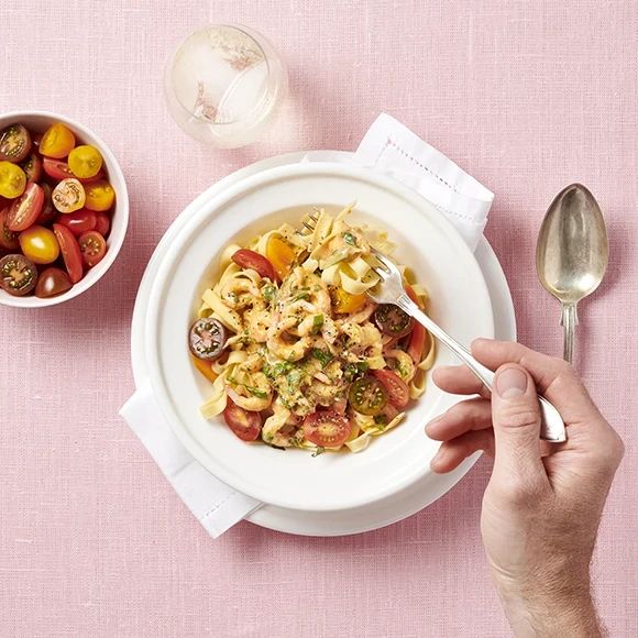 Het räkpasta med tomater Het räkpasta med tomater