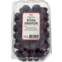 Illustration av Röda kärnfria druvor i ask