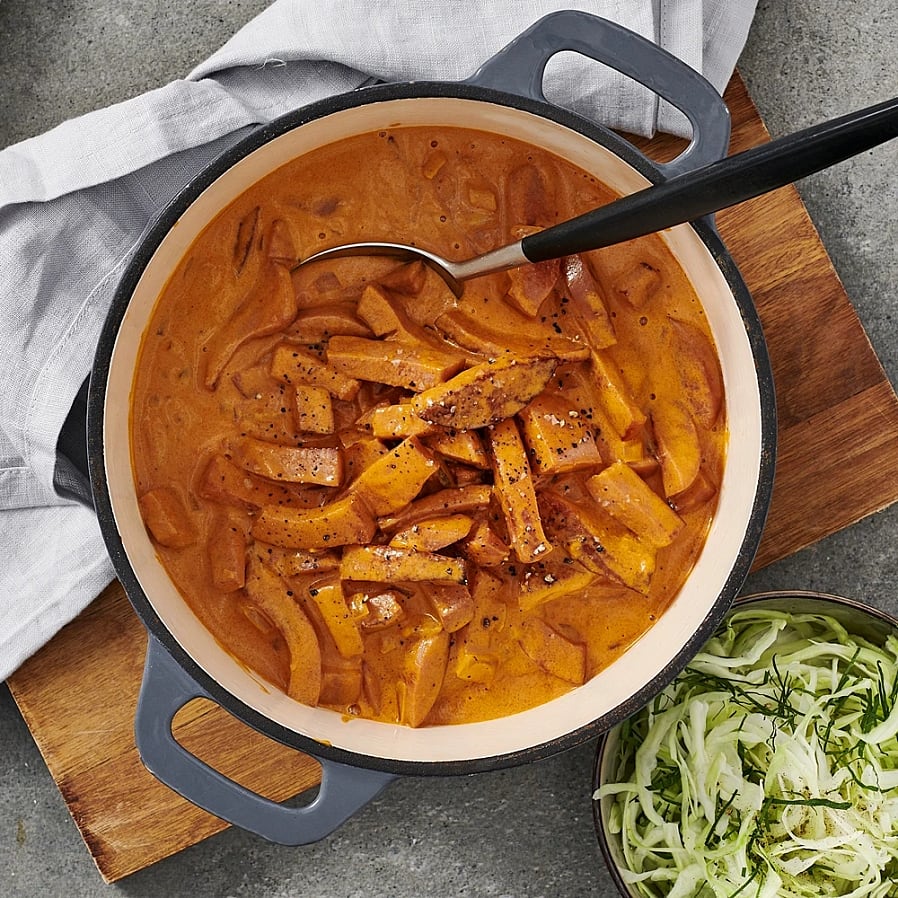 A plate of Korvstroganoff with rice, showcasing a rich, savory dish that highlights the strategic balance between bold flavors and balanced ingredients, much like the Yankees' potential Bellinger trade—where power and flexibility are key.