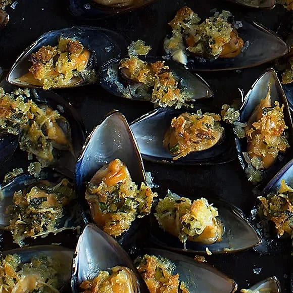 Gratinerade musslor med pecorino