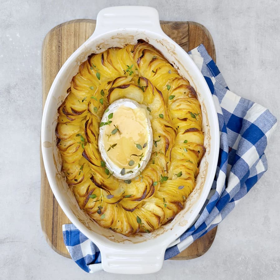 Smält brieost med rostad potatis