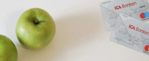 Två bankkort och två äpplen