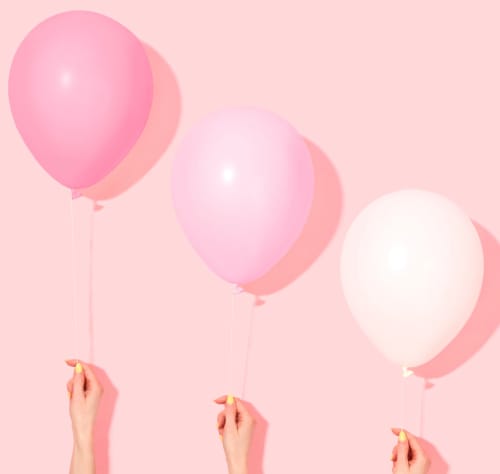 Tre rosa ballonger