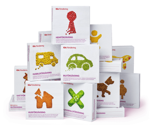 En hög med produktboxar med förs äkringar från ICA Försäkring.