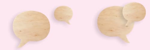 Pratbubblor mot en rosa bakgrund.