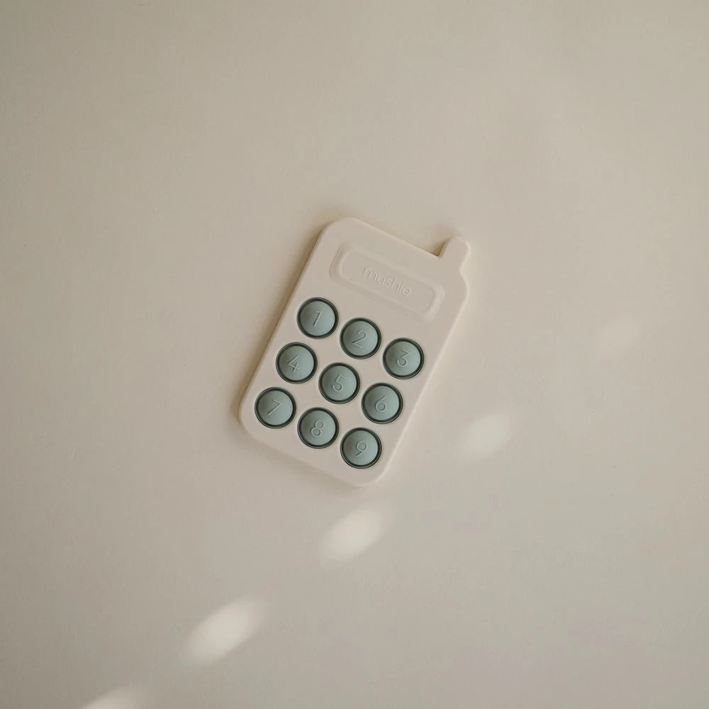 Mushie Phone Press Toy Cambridge Blue Mushie