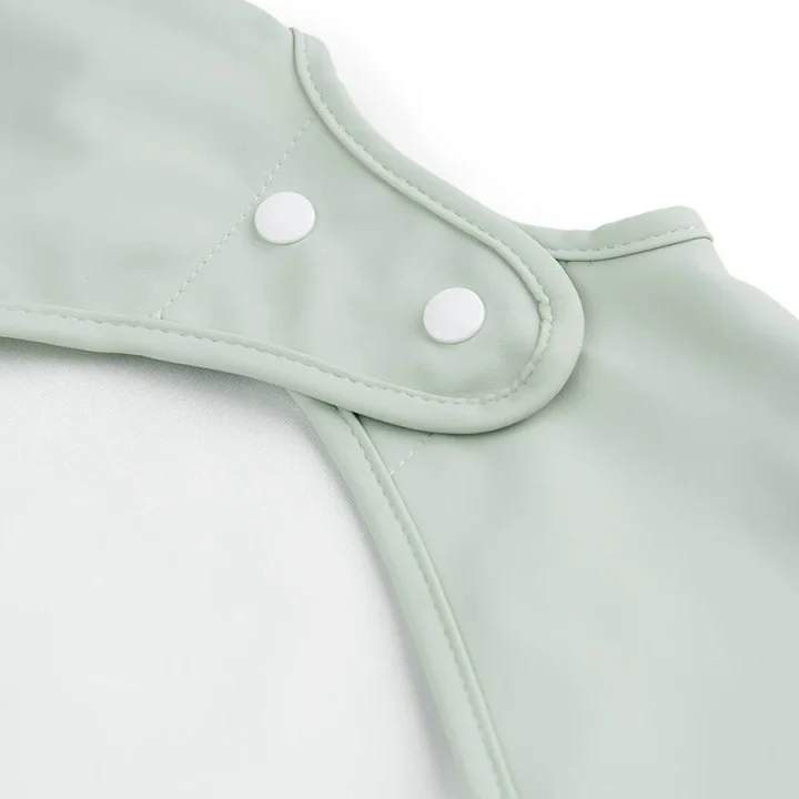Done by Deer Sleeved Pocket Bib Croco Green Done by Deer