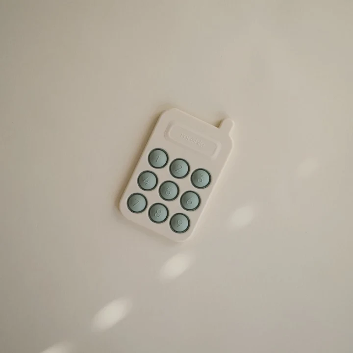 Mushie Phone Press Toy Cambridge Blue Mushie