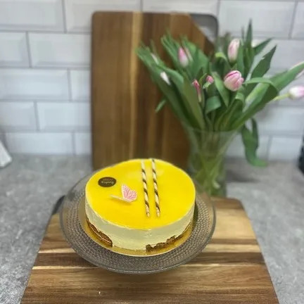 Moussetårta med mango och passion