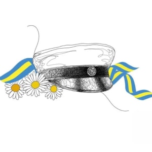 Studentmössa med blommor och svenskaband