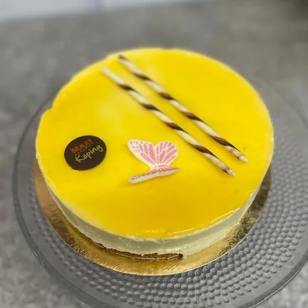 Moussetårta med mango och passion