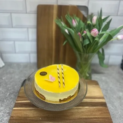Moussetårta med mango och passion