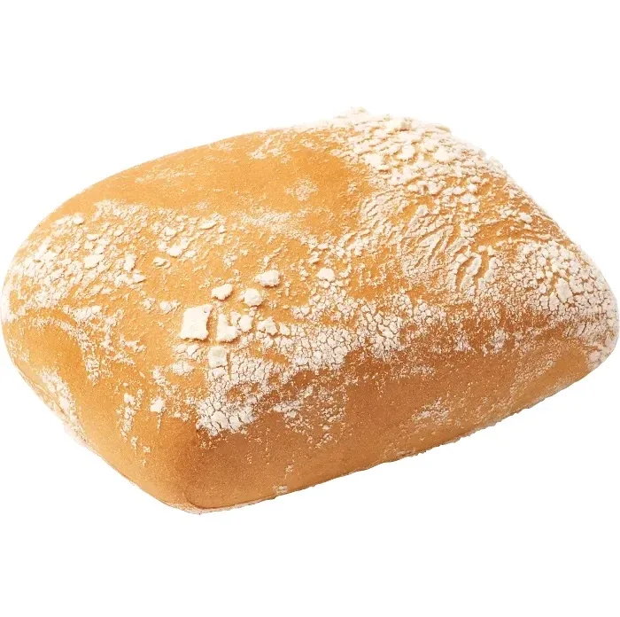 Bild på en brödlimpa. Mjöl på ovansidan.