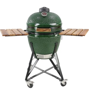 en grön keramikgrill mot en vit bakgrund