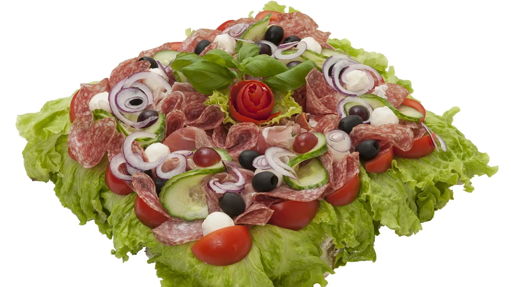 Italiensk smörgåstårta Med soltorkade tomater- och paprikafyllning. Garnerad med lufttorkad skinka, salami, mozzarella och grönsaker.