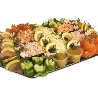Lyxplanka med Laxpatè, handskalade räkor, kräftstjärtar, kallrökt lax, gravad lax, hovmästarsås, romsås, stenbitsrom samt potatissallad eller potatisgratäng