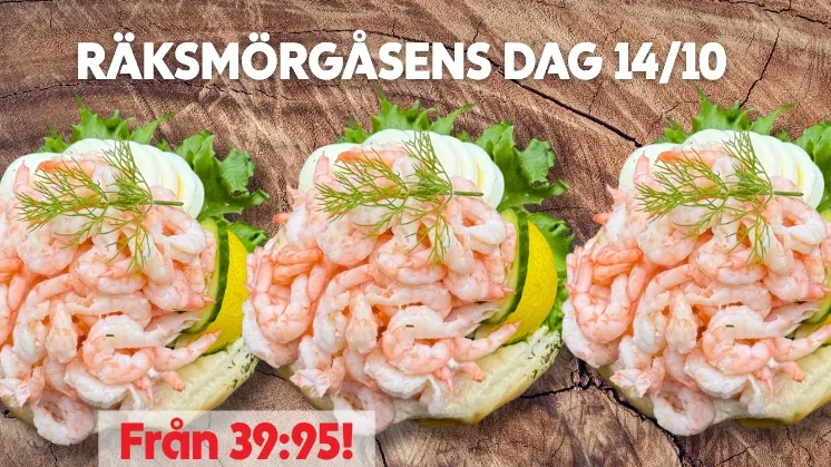 Bilden visar personal so mtillverkar en smörgåstårta