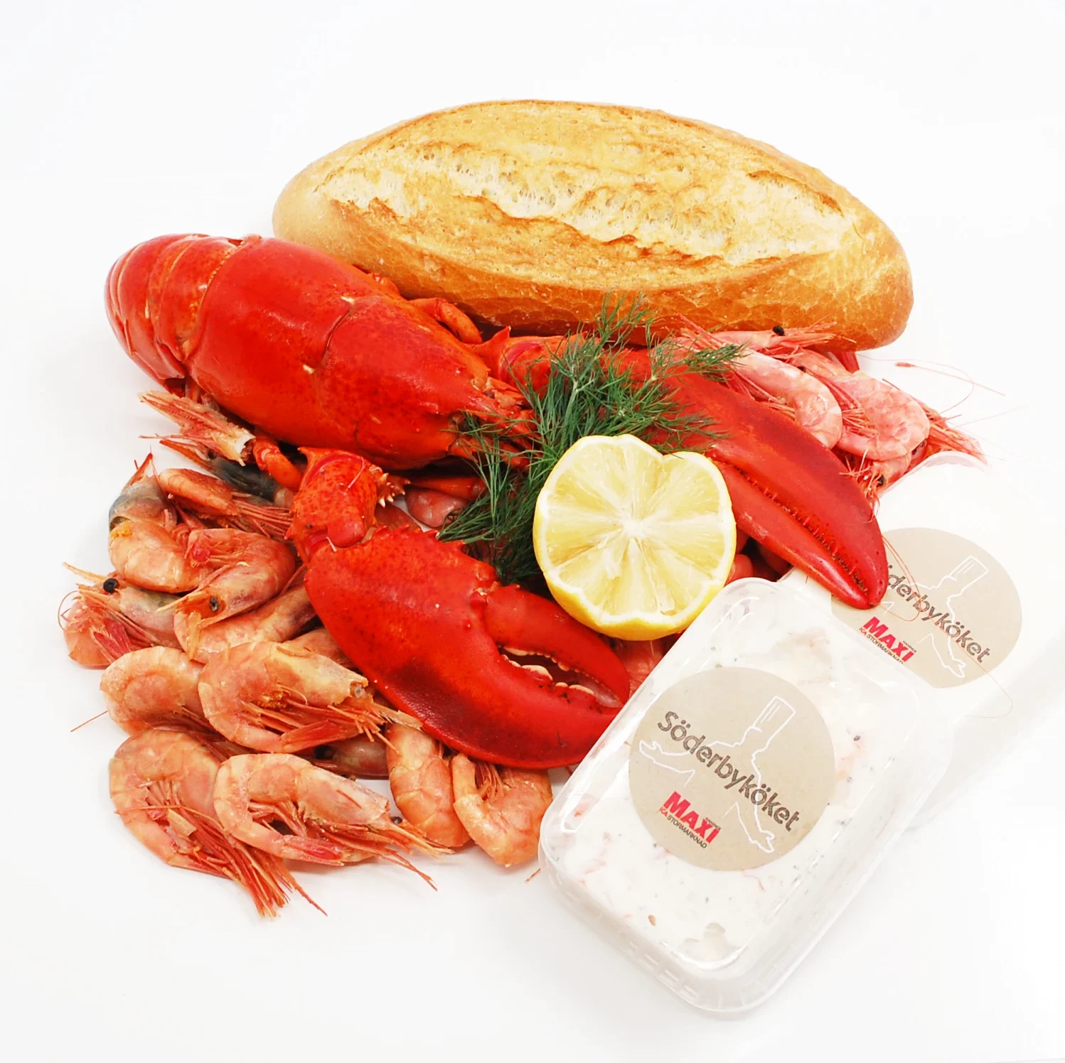 Rökta räkor i botten men en hummer ovanpå. En burk aioli, en burk räk och parmesanröra och en baguette bredvid. Dekorerad med dill och citron