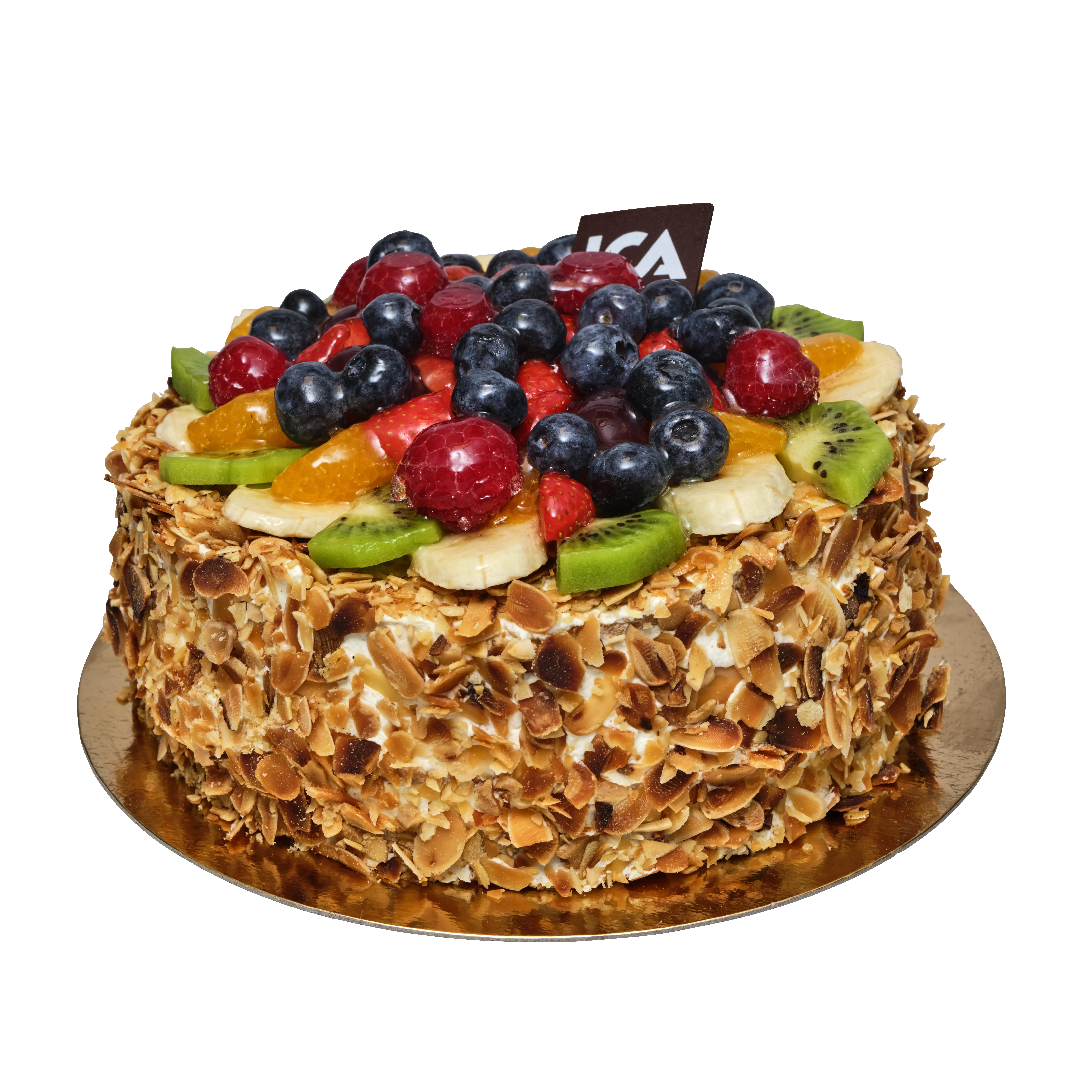 En frukttårta med en mängd olika bär och frukter, fylld med grädde och vaniljkräm, täckt med mandel.