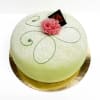 En grön princesstårta med rosa ros.