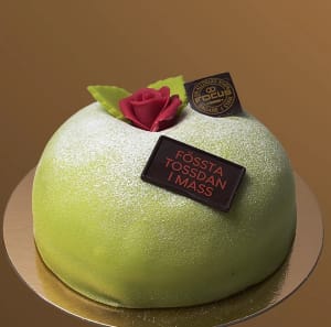 en Grön prinsesstårta med chokladskylt: Fössta tossdan i mass