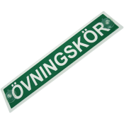 Övningskörningsskylt med sugproppar.