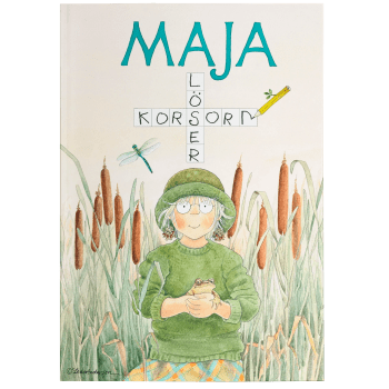 Maja löser korsord.