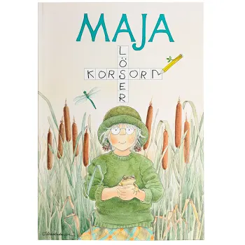 Maja löser korsord.