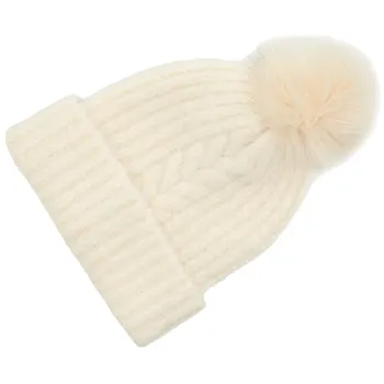 Mössa snövit med pompom.