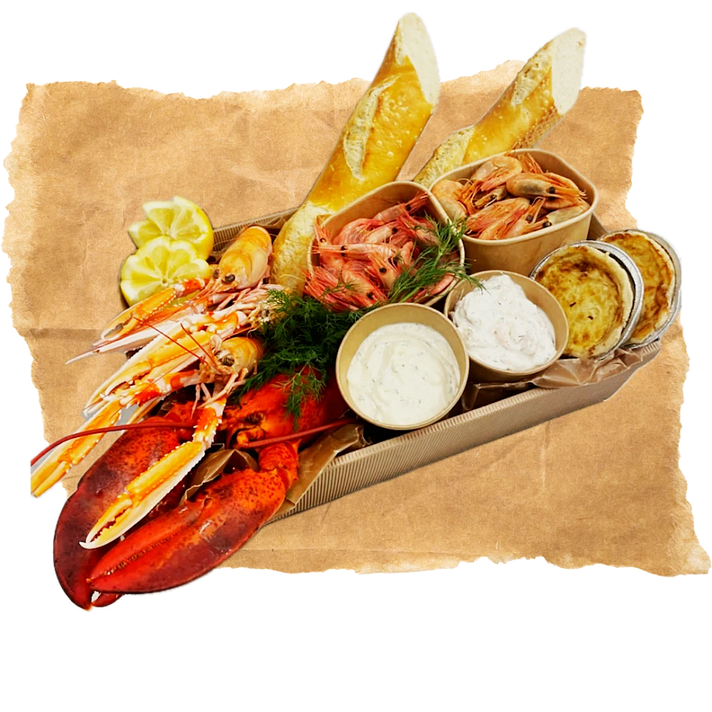 Skaldjurskasse, räkor, hummer, baguette, citron