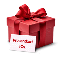 Ett rött paket med en rött sidenband och en lapp där det står presentkort.