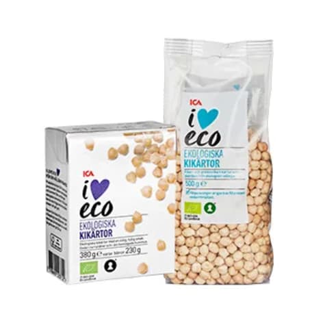 En kartong och en påse med kikärtor står bredvid varandra.