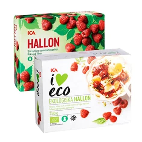 Två förpackningar med frysta hallon står bredvid varandra.
