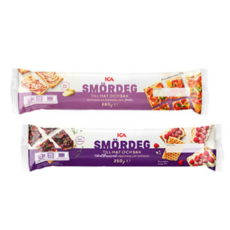 Två förpackningar med smördeg ligger bredvid varandra.