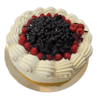 Gräddtårta toppad med bär och vispad grädde.