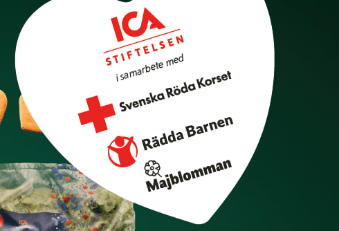 En hjärtformad skylt med text hänger framför förpackningar.