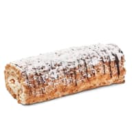 Budapestbakelse dekorerad med florsocker och chokladlinjer.