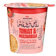 En rosa och röd förpackning med pasta, tomat och mozzarella