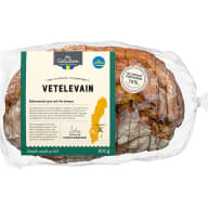 Ett förpackat bröd med en etikett ligger på en yta.