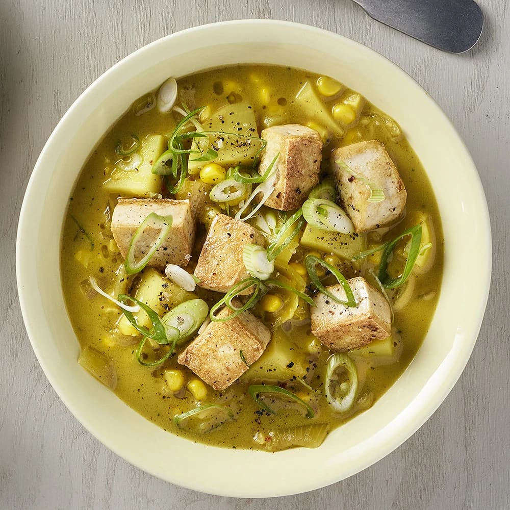 Majskolv i massamancurry med salladslök och tofu